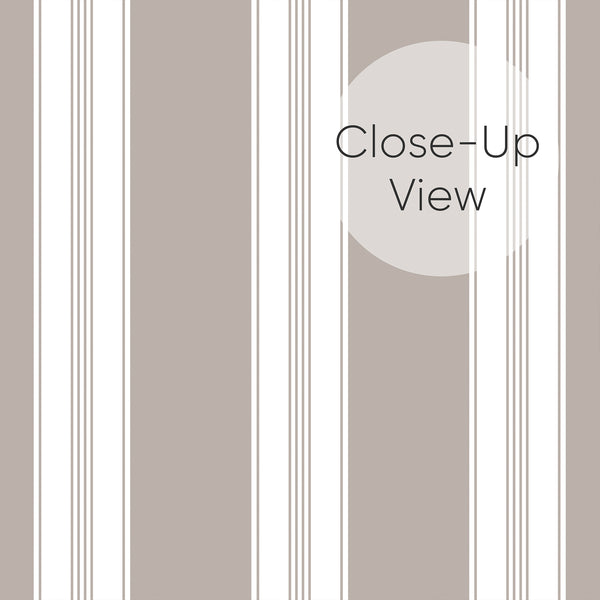 Close up of removable wallpaper with warm taupe panels, crisp white vertical bands, and refined pinstripe accents for contemporary interiors and home offices.