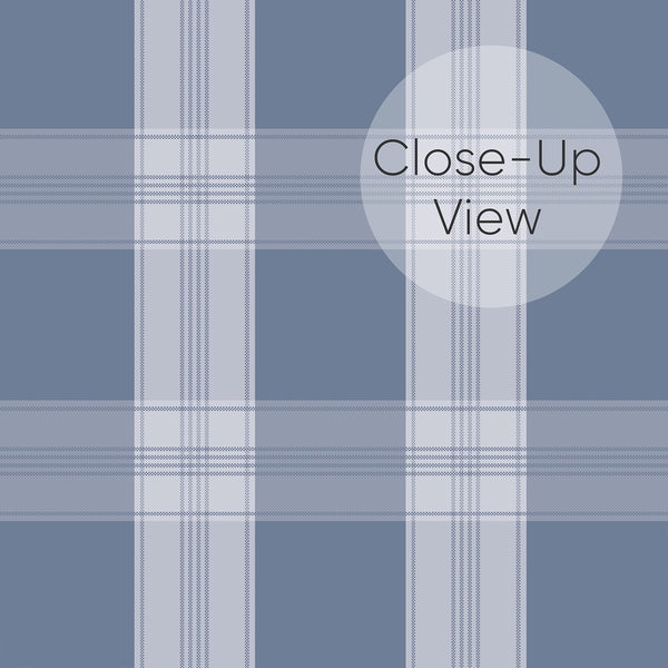 Close up of muted navy plaid wallpaper with light blue-gray checks and subtle woven-style lines, ideal for nursery wallpaper or coastal bedroom decor.