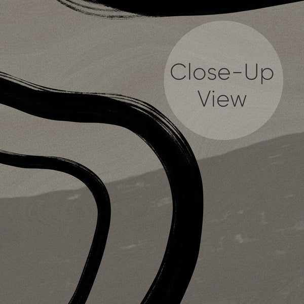 Close up of Gray and black wallpaper featuring sweeping organic lines and a subtle textured background for a minimalist modern bedroom accent wall.