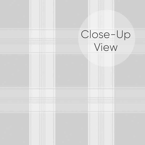 Close up of removable wallpaper in light gray and white with a subtle plaid pattern, fine vertical and horizontal stripes, and a timeless neutral appearance.