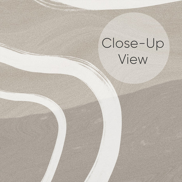 Close up of modern abstract wallpaper featuring bold white curved lines over warm beige and light taupe tones for minimalist home decor.