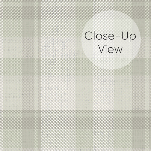 Close up of light sage green checkered wallpaper showcasing a timeless tartan pattern with subtle woven texture and soft earthy tones, perfect for a vintage cottage bedroom.