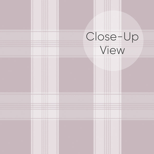 Close up of removable wallpaper in dusty mauve and ivory with a classic plaid pattern and fine vertical and horizontal lines for an accent wall.