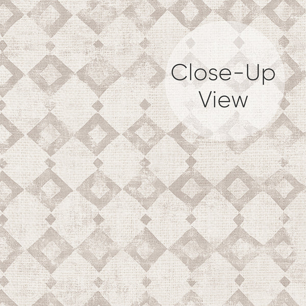 Minimalist geometric wallpaper with a subtle diamond and square pattern in taupe on an off-white background. The removable design is eco-friendly and Made in the USA, suitable for bedrooms.