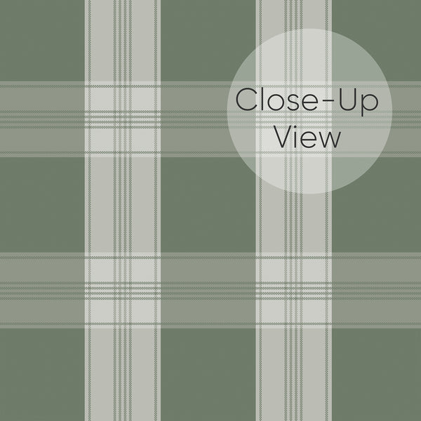 Close up of removable wallpaper in dark green and muted sage with a timeless plaid pattern and fine vertical and horizontal lines.