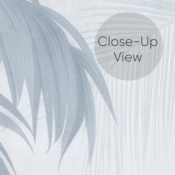 Close up of Soft blue botanical wallpaper with tall palm trees, feathery leaves and subtle layered tropical foliage on a light neutral background.