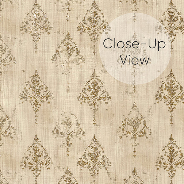 Close up of antique gold and beige damask wallpaper with decorative floral motifs and aged texture, creating an elegant vintage look for a bedroom accent wall.