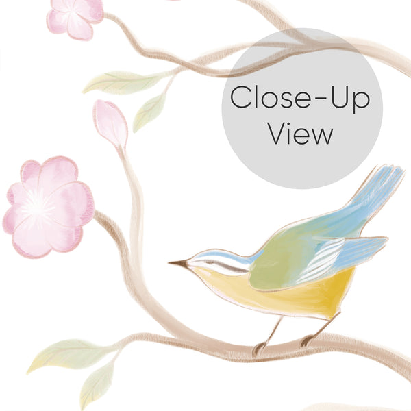 Close up of elegant white botanical wallpaper with herons, flowering branches, small colorful birds and butterflies for a bright bedroom accent wall.