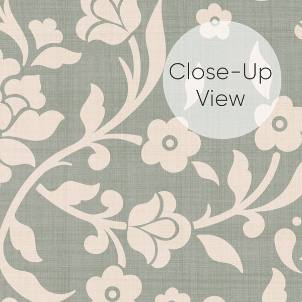 Close up of sage green and cream peel and stick wallpaper featuring a repeating floral damask pattern with stylized flowers, curved vines and a subtle textured background.