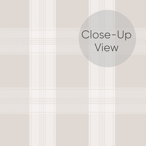 Close up of Removable wallpaper in beige and ivory with a soft plaid pattern, fine vertical and horizontal stripes, and a clean look for a bedroom accent wall.