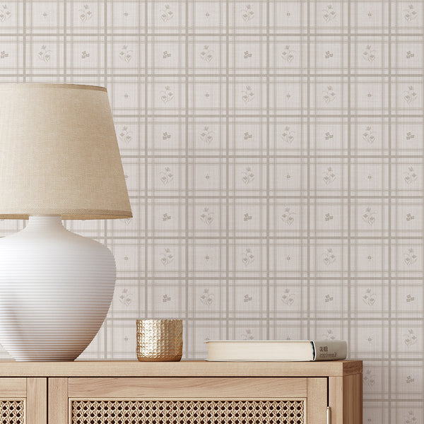 Taupe greige plaid wallpaper with delicate floral motifs and soft neutral checkered pattern for cozy cottagecore interiors