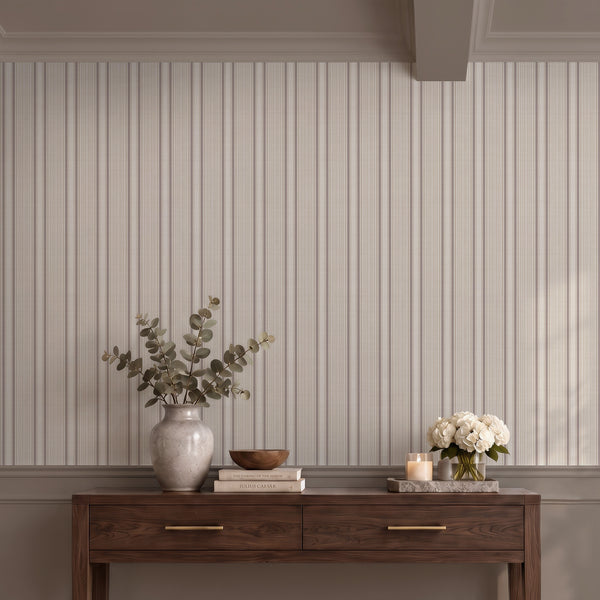 Beige and brown striped wallpaper featuring delicate vertical woven-style lines with a subtle herringbone pattern, ideal for vintage farmhouse bedroom decor.