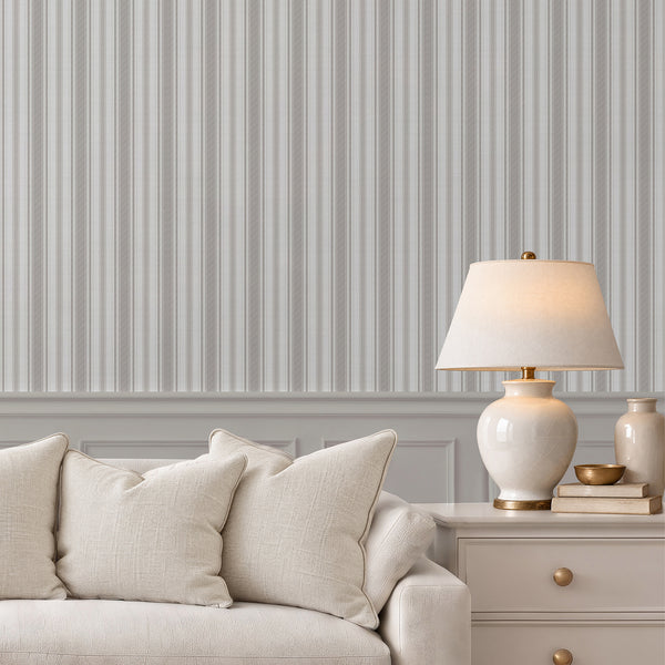 Beige gray and white striped wallpaper featuring narrow vertical woven-style lines with subtle herringbone detailing, ideal for English country cottage bedroom decor.