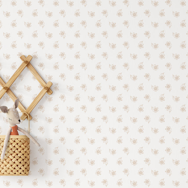 Beige floral wallpaper with delicate hand drawn flowers scattered across a clean white background, ideal for a neutral nursery or minimalist bedroom.