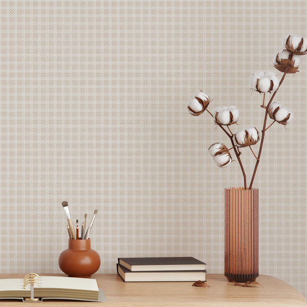 Beige geometric wallpaper with a repeating white trellis pattern and subtle textured background, ideal for a neutral modern bedroom or living room.