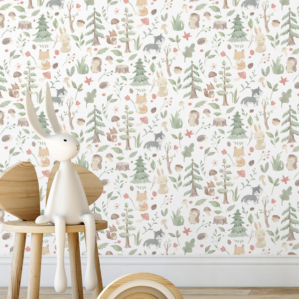 Watercolor woodland nursery wallpaper with soft sage green trees, bunny, fox, owl, hedgehog, mushrooms and leaves on white background.