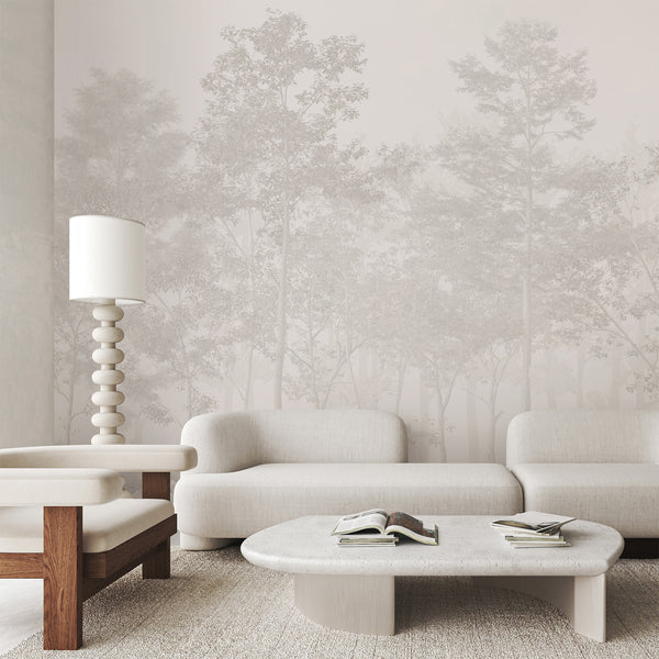 Neutral forest wall mural with layered tree silhouettes in soft beige-gray, creating a serene backdrop for living rooms.