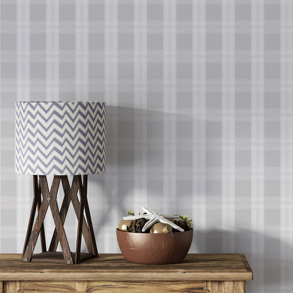 Light gray plaid wallpaper with soft white checks and fine intersecting lines, creating a clean neutral pattern for bedrooms, living rooms, and home offices.