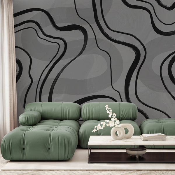 Black and gray abstract wallpaper featuring bold flowing curved lines over a textured gray background for a modern minimalist bedroom or living room.