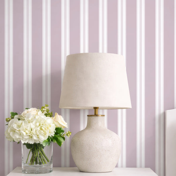Minimalist mauve wallpaper featuring a timeless vertical stripe pattern with slim white pinstripe accents for bedrooms, living rooms, or entryways.