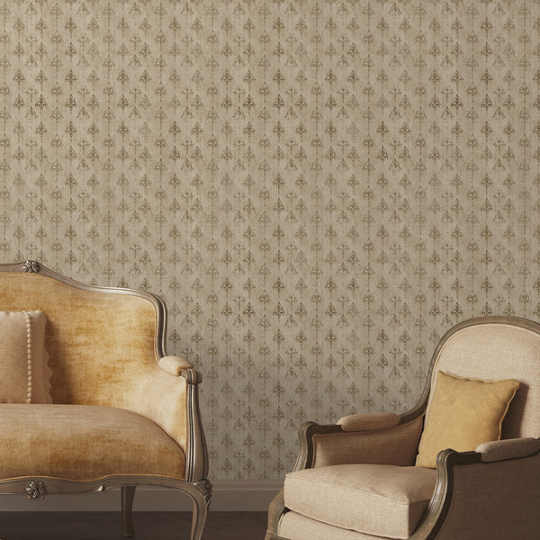 Distressed damask wallpaper featuring ornate brown gold floral medallions over a warm beige textured background for vintage and French country interiors.