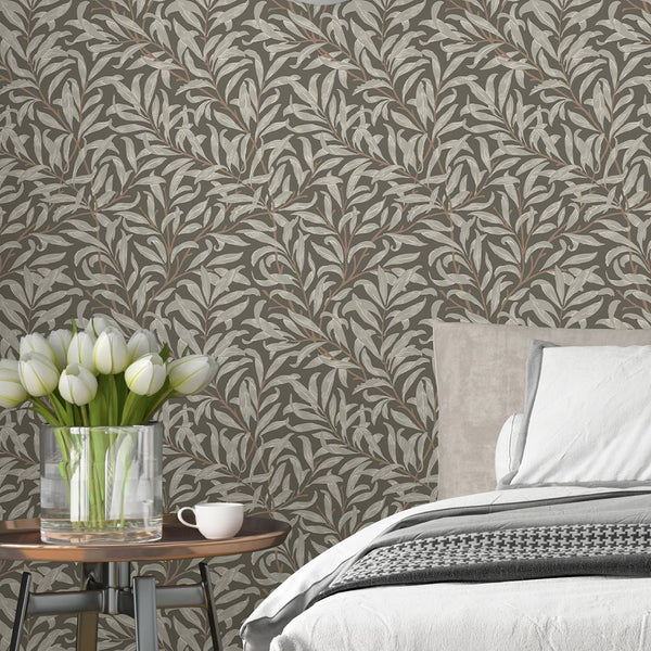 Timeless wallpaper with arching willow branches and finely hatched leaves on a taupe-brown background. Ideal for a calm, heritage-inspired living room, this removable wallpaper offers high-quality materials and easy repositioning.