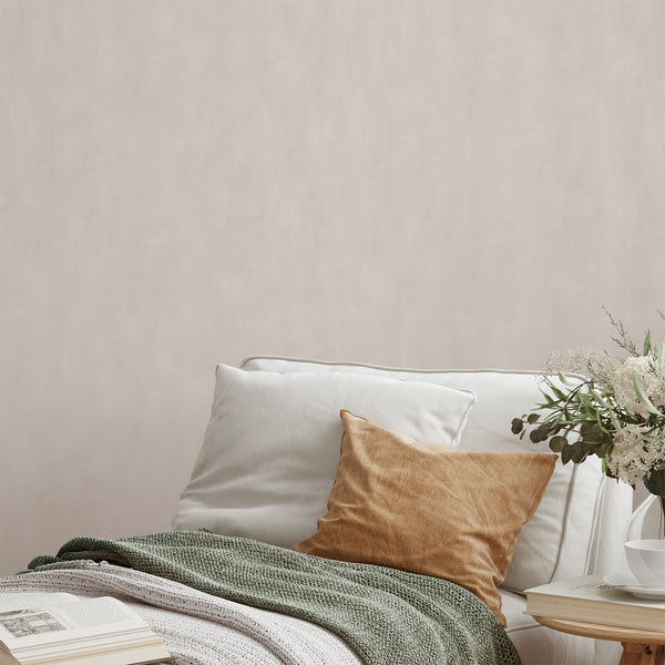 Beige plaster look wallpaper with soft, mottled movement and gentle cloud-like variation, perfect for creating a calm, matte finish in living rooms. This wallpaper complements Scandinavian and Japandi interiors with its warm tones.