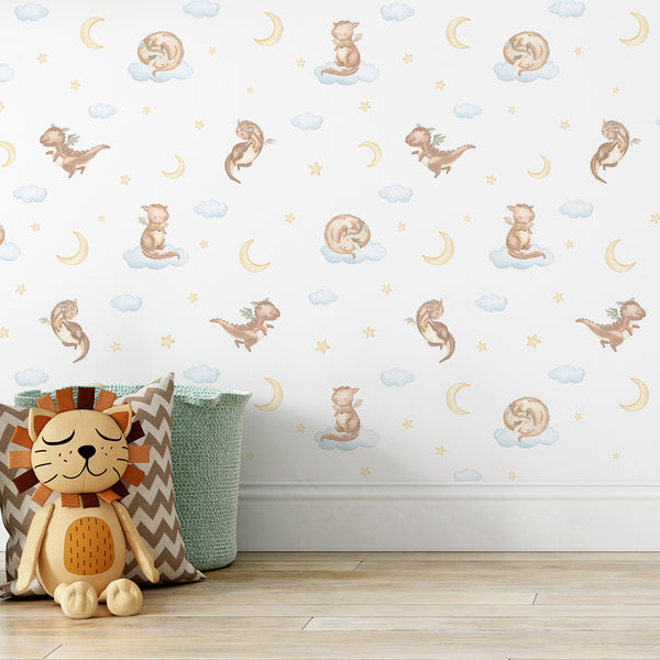 Magical nursery wallpaper featuring a cute watercolor dragon sitting among pastel blue clouds and yellow stars for whimsical baby room wall decor.