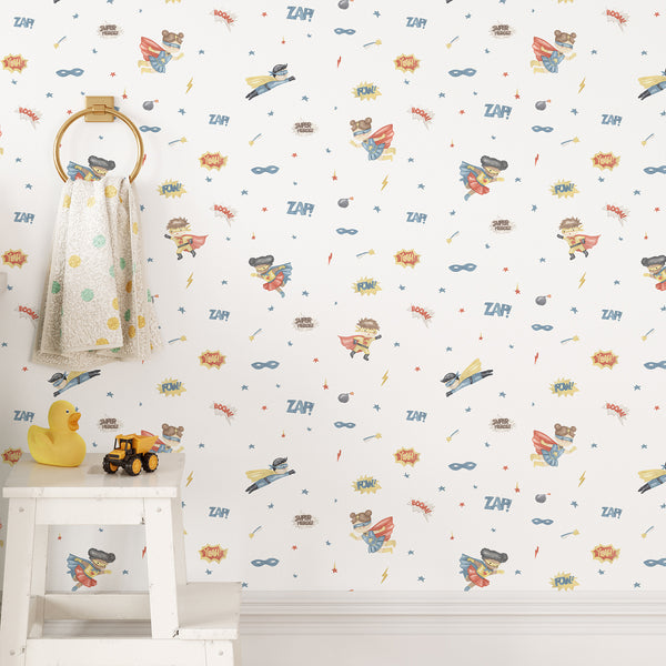 Watercolor superhero wallpaper with flying boys and girls, masks, stars, lightning bolts and comic words in blue, red and yellow on white.