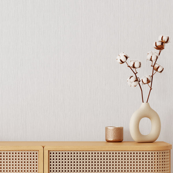 Light Gray Vertical Texture Wallpaper with a pale gray ground and fine thread-like vertical strokes. This eco-friendly, removable peel and stick wallpaper offers a fabric-inspired finish ideal for a modern living room, minimalist bedroom, or entryway, enhancing height and quiet movement.