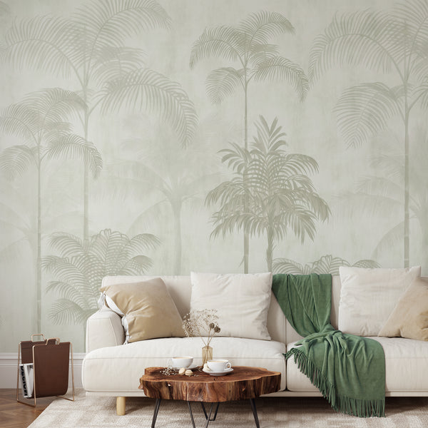 Soft sage green tropical palm tree wallpaper featuring tall palms and layered botanical foliage in a light neutral palette for modern interiors.