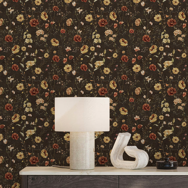 Dark brown floral wallpaper with airy botanical stems and small blooming flowers in cream, terracotta, and yellow for vintage farmhouse room decor.