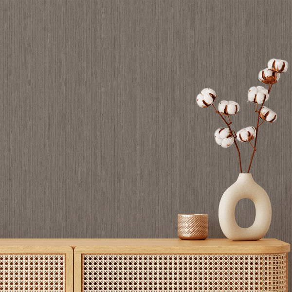Taupe Vertical Texture Wallpaper with narrow striations mimicking woven grasscloth, adding height and movement to a modern bedroom or home office. This removable wallpaper is ideal for Japandi or minimalist interiors, offering eco-friendly materials and easy application.