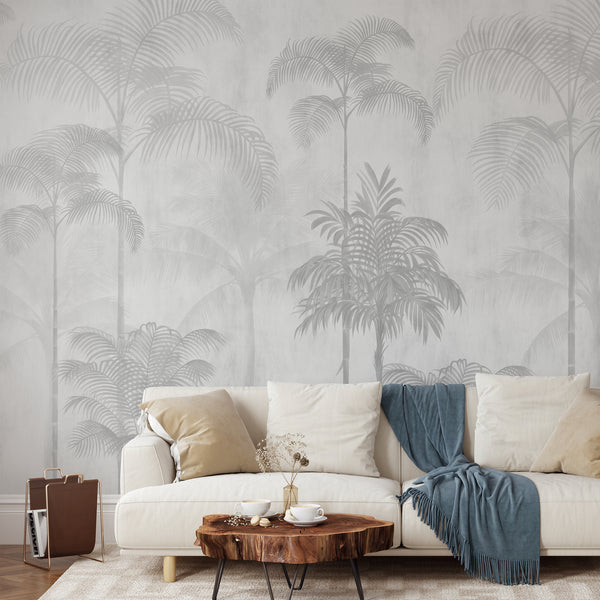 Soft gray tropical palm tree wallpaper featuring tall palms and layered botanical foliage in light neutral tones for a minimalist modern interior.