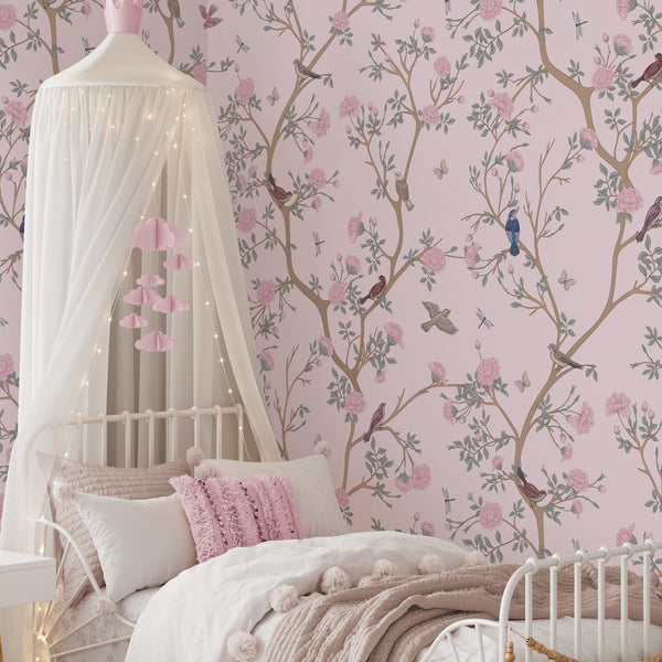 Vertical Blossom Tree wallpaper featuring delicate branches with flowers and birds on a blush backdrop. Perfect for creating a calming atmosphere in nurseries, this peel and stick wallpaper is ideal for renters and designers alike.