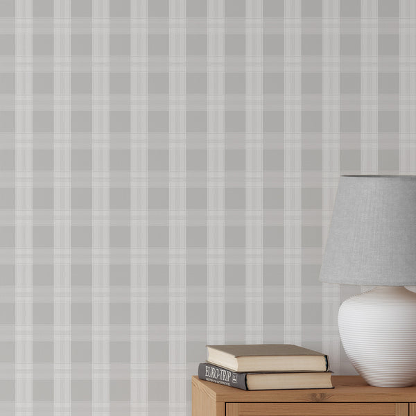 Light gray plaid wallpaper with soft white check lines and an oversized grid pattern, creating a clean neutral look for a nursery, bedroom, or living room.