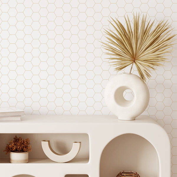 Close-up of beige hexagon grid pattern on white background, creating a calm and precise geometric backdrop. Ideal for bathrooms or hallways, this self-adhesive wallpaper brings a modern touch to any room, with its subtle design enhancing neutral and minimalist decor styles effortlessly.