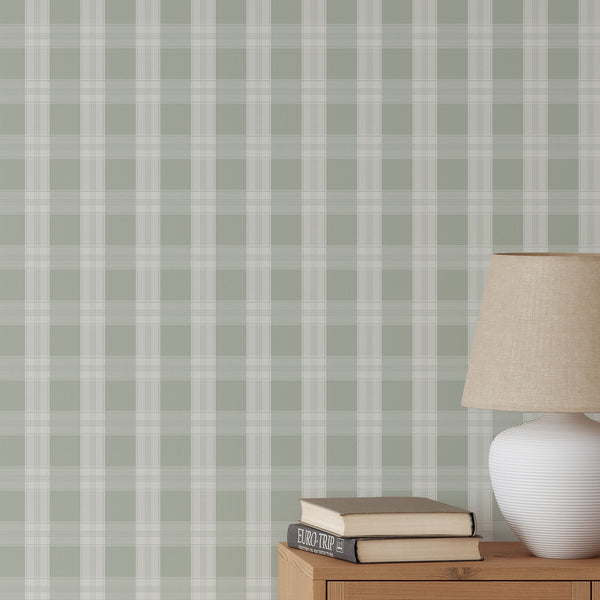 Light sage green plaid wallpaper with soft white check lines and an oversized grid pattern, creating a clean cozy look for a nursery, bedroom, or living room.