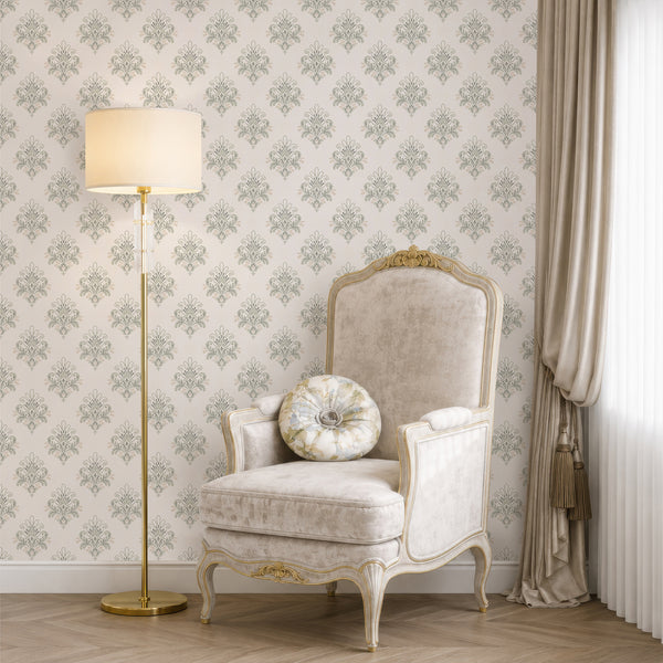 Vintage ornamental damask wallpaper featuring symmetrical sage green motifs, graceful curved leaves, and a light neutral background for classic interiors.
