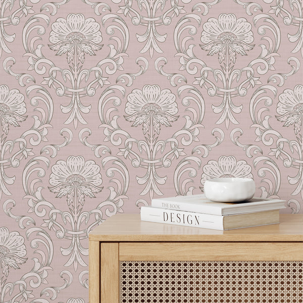 Blush pink floral damask wallpaper with oversized scrollwork, creating a glamorous feature wall for a bedroom. Removable peel and stick design, ideal for cottage decor.