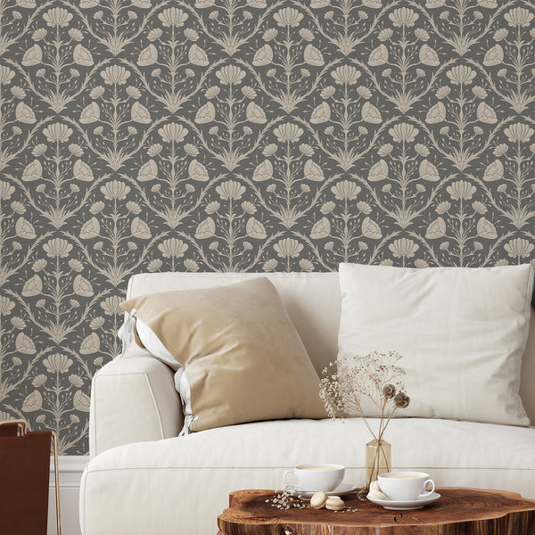 Dark vintage floral wallpaper with beige botanical sprays on charcoal slate, ideal for Arts and Crafts inspired rooms.