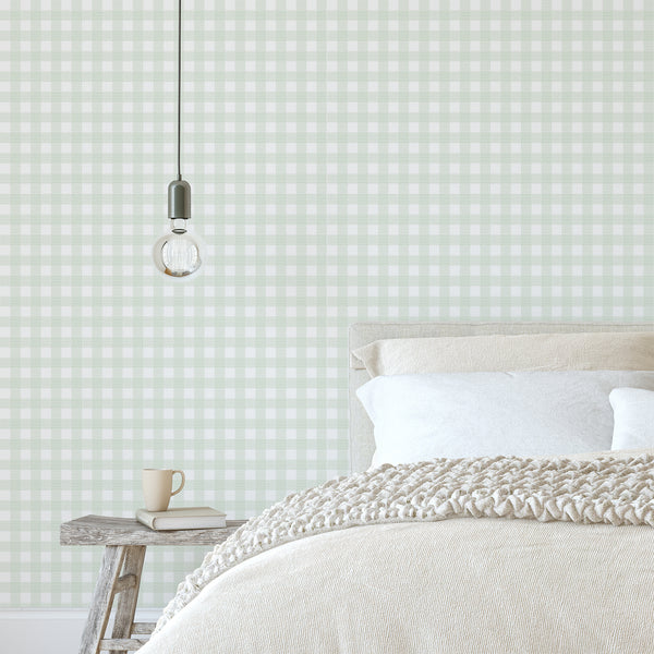 Sage green plaid wallpaper featuring a soft gingham check pattern with fine striped details on a white background for farmhouse interiors.