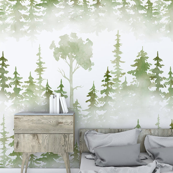 Soft watercolor brushstrokes create a forest of pine trees in orderly bands, providing a tranquil backdrop for children's rooms or home offices. The traditional unpasted wallpaper design is eco-friendly, Made in the USA, and highlights the beauty of nature in interior design.